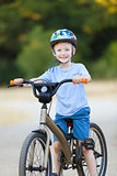 kid riding bicycle