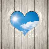 wooden heart with the blue sky