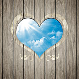wooden heart with the blue sky