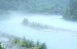 Dense fog over river.