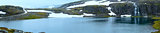 Summer mountain panorama with lake and snow (Norway)