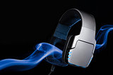 Silver large headphones with stream of blue smoke