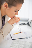 Portrait of business woman with eyeglasses at work
