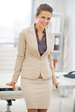 Portrait of smiling business woman in office