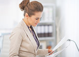 Business woman working with documents in office