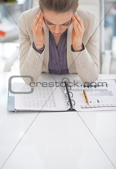 Portrait of frustrated business woman at work
