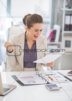 Portrait of happy business woman at work