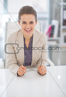 Portrait of happy business woman with eyeglasses