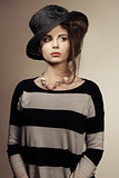 trendy woman with black hat 
