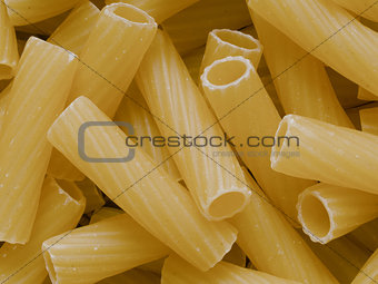 uncooked maccheroni pasta tubes food texture background