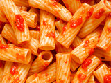 maccheroni pasta in tomato sauce food background