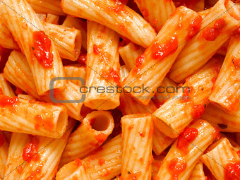maccheroni pasta in tomato sauce food background