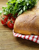 traditional Italian ciabatta bread with tomatoes and herbs