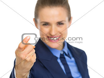 Closeup on business woman beckoning with finger