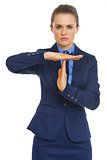 Business woman showing break gesture