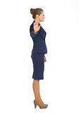 Full length portrait of business woman showing stop gesture