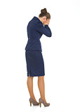 Full length portrait of frustrated business woman