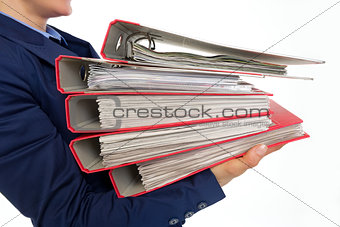 Closeup on business woman holding folders