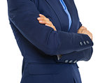 Closeup on business woman with crossed arms on chest