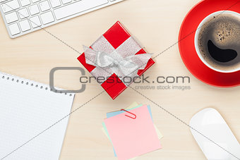 Red gift box on office table