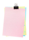 Colorful lined office paper with clip