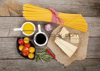 Parmesan cheese, pasta, tomatoes, herbs and spices