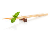 Sushi chopsticks with mint leaves