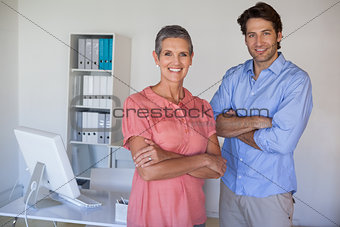 Casual confident business team smiling at camera