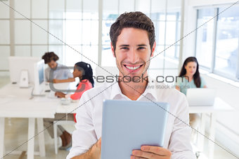 Businessman working on tablet pc