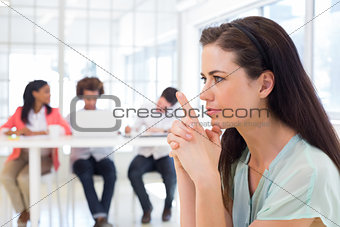 Attractive businesswoman concentrating and focusing