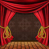 Opened red stage curtains