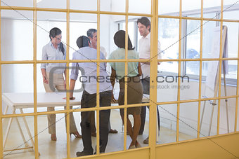 Attractive business people speaking with each other