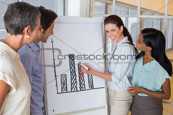 Business people working on graph for presentation
