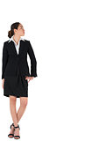 Businesswoman in suit looking to the side