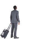 Businessman standing with his suitcase