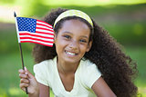 Young girl celebrating independence day in the park