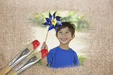 Composite image of little boy with pinwheel