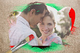 Composite image of happy couple in the countryside
