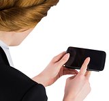 Businesswoman holding smartphone showing screen