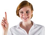 Businesswoman smiling and pointing