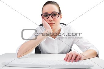 Businesswoman typing on a keyboard
