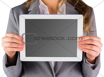 Businesswoman showing a tablet pc