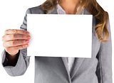 Businesswoman showing a blank card