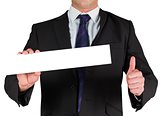 Businessman showing blank white card