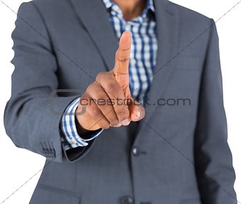 Focused businessman pointing
