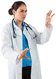 Young doctor standing with hands up