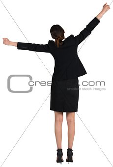 Excited businesswoman cheering
