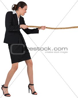 Businesswoman pulling a rope