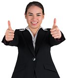 Happy businesswoman showing thumbs up