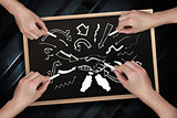 Composite image of multiple hands drawing arrows with chalk